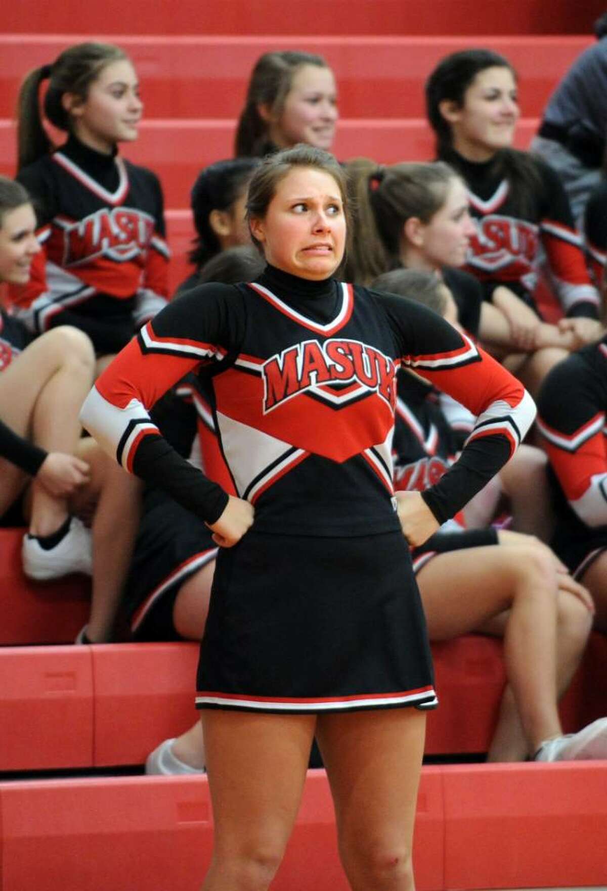A Masuk cheerleader reacts during game action against Bunnell Wednesday Feb. 17, 2010 at Masuk.