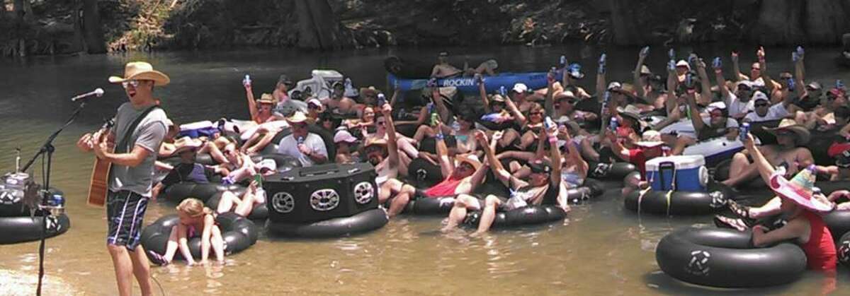 July 2014: Organizers at Rockin' R River Rides on the Guadalupe River in New Braunfels estimated a couple thousand people showed up at Texas country star Roger Creager's annual birthday bash to break the record. The record was previously listed as an "open record" by the Guinness Book of World Records, and in order to break the record, the float needed 250 participants.