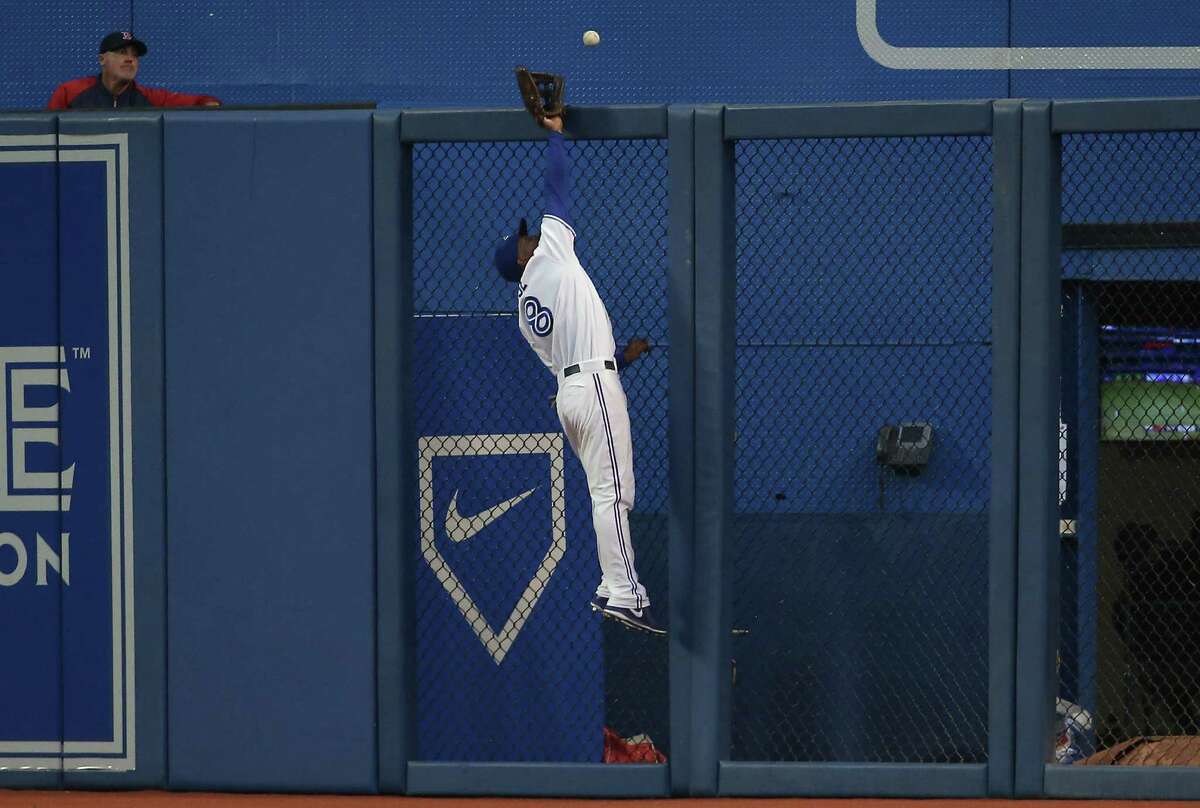 Miami Marlins' Adam Duvall can't catch a double hit by Arizona