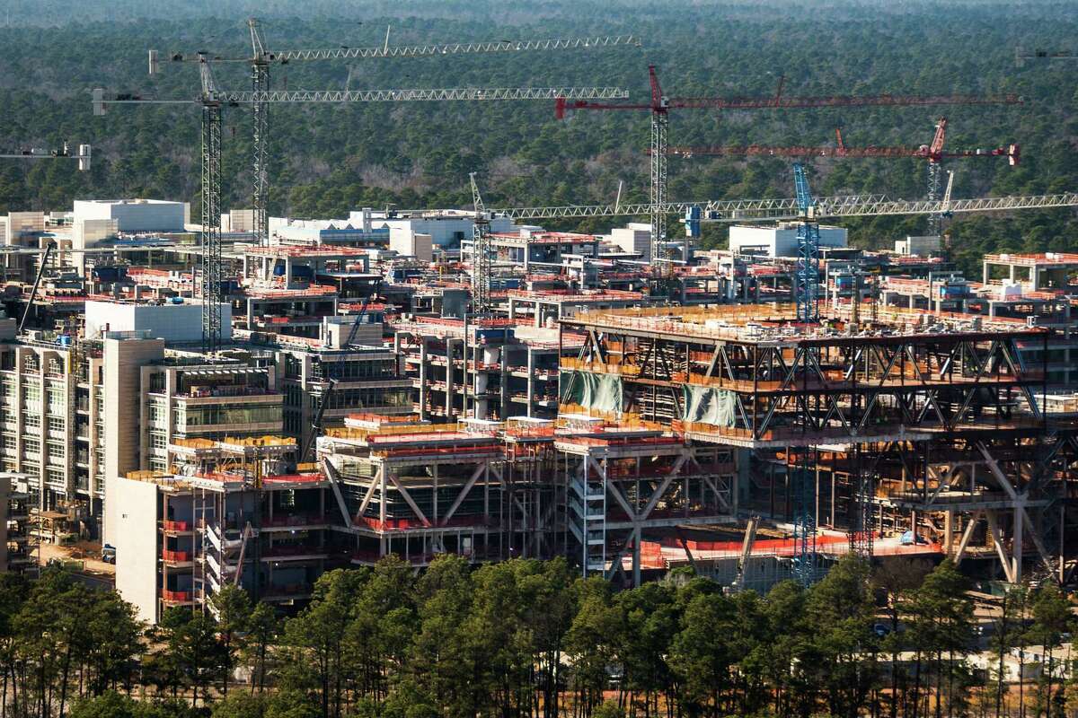 The new Exxon Mobil Corp. campus under construction near Interstate 45 and the Hardy Toll Road is driving up area home prices.