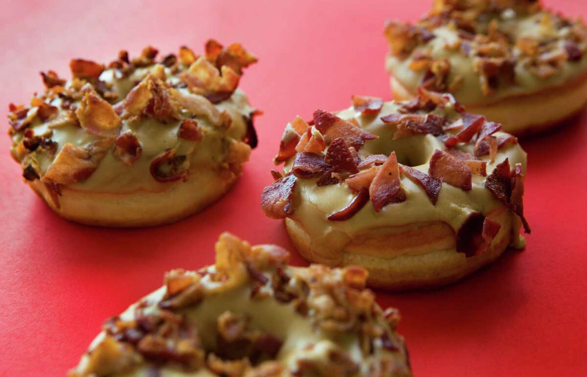 Maple bacon and turkey bacon doughnuts are part of the wide selection of gourmet doughnuts at Glazed. The specialty coffee shop owned by Edose Ohen, 28, of Houston will be soft opening on July 26th. Tuesday, July 22, 2014, in Houston. ( Marie D. De Jesus / Houston Chronicle )
