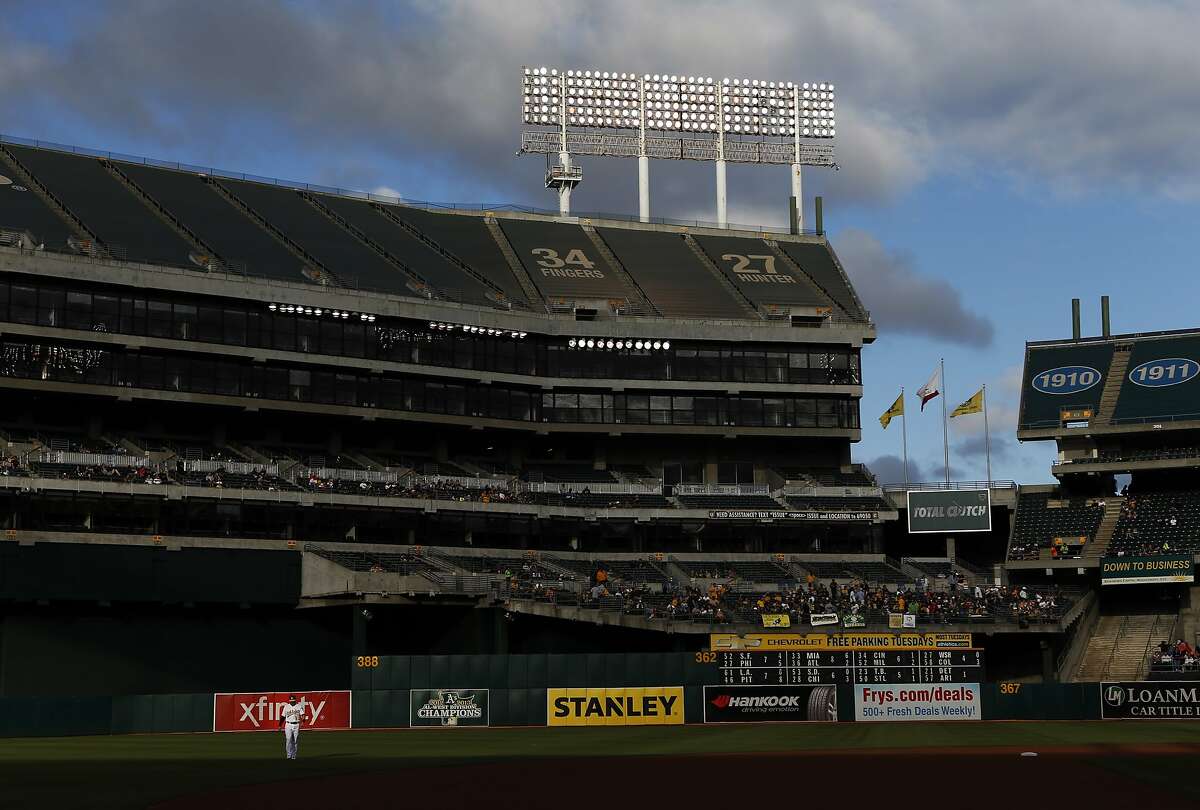Oakland Athletics' Nick Punto warms up before playing Houston Astros in MLB game at O.co Coliseum in Oakland, Calif. on Tuesday, July 22, 2014.