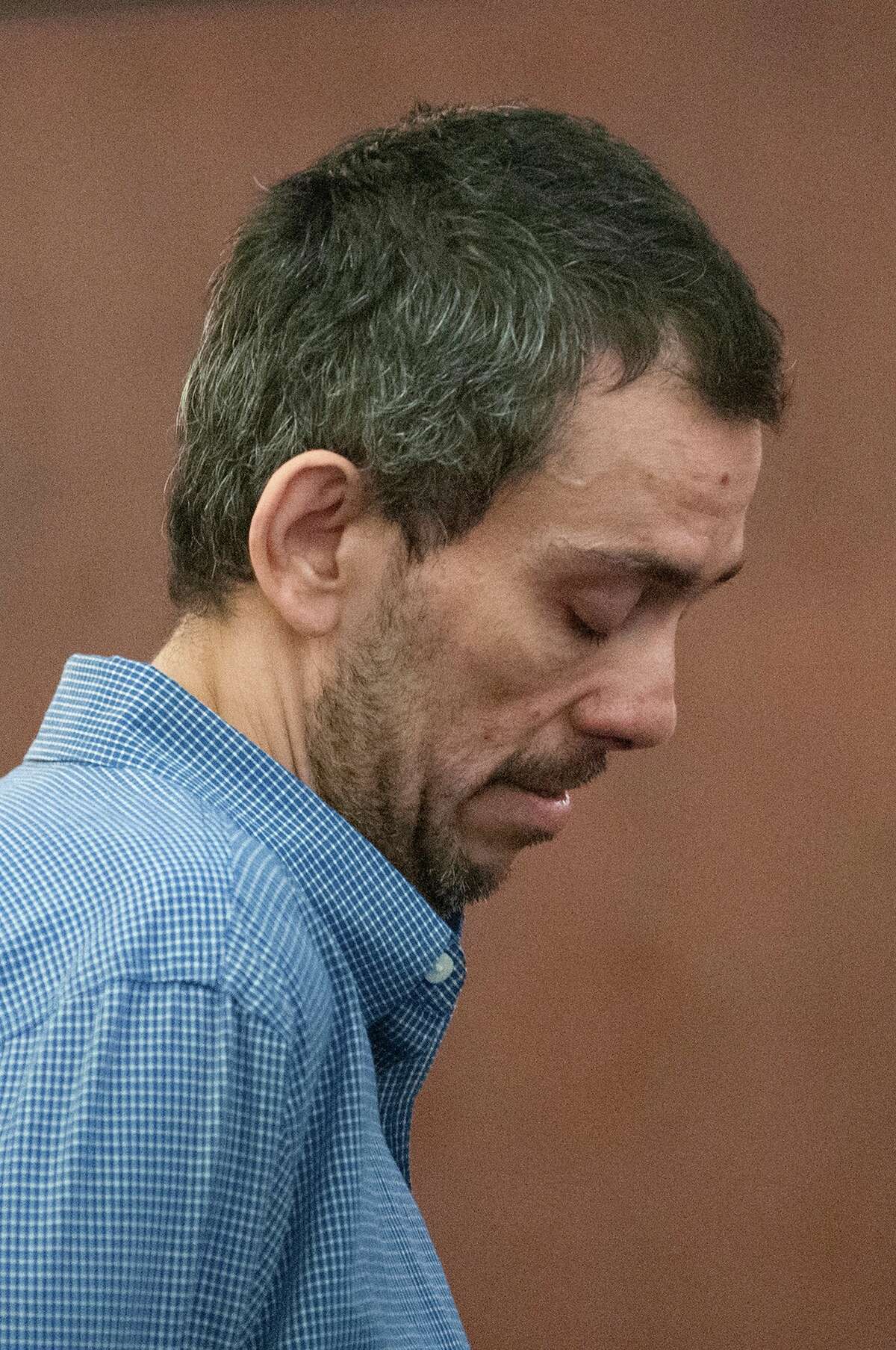Pablo Cruz reacts after a jury found him guilty of second-degree murder Wednesday, July 23, 2014, at the Albany County Courthouse in Albany.