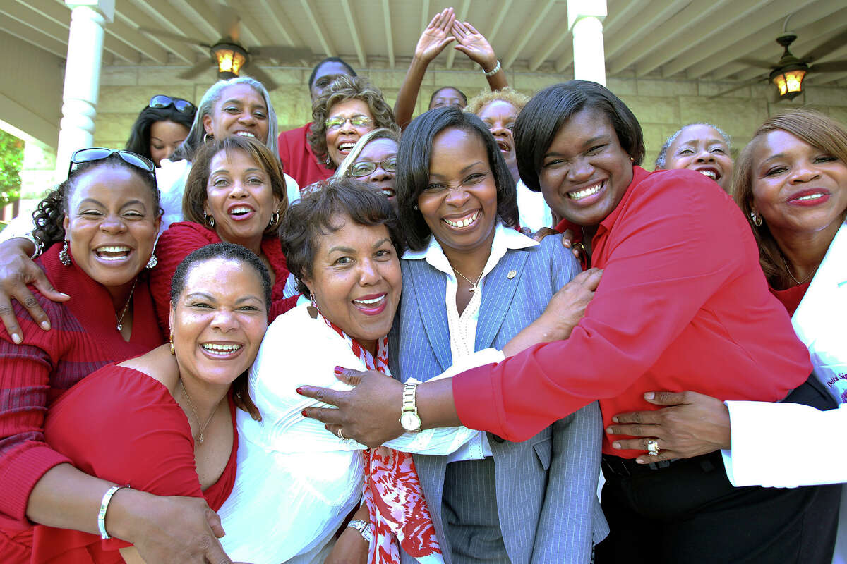 Ivy Taylor gathers with her sorority sisters for a photo session as she meets supporters at a reception at 950 E. Grayson after being elected Mayor of San Antonio on July 22, 2014.