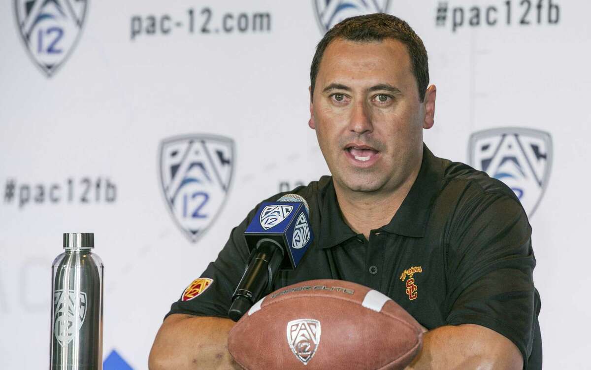 Southern Cal coach Steve Sarkisian, who left Washington after last season, thinks the Trojans can contend for the league title.