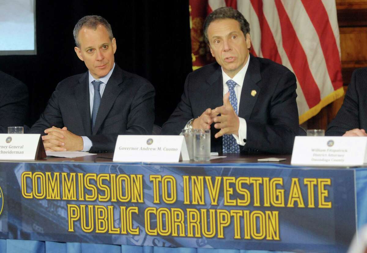 New York State Attorney General Eric Schneiderman, left, and Governor Andrew Cuomo take part in press conference at the Capitol on Tuesday, July 2, 2013, where Governor Cuomo introduced the members of the Moreland Commission that will investigate public corruption around the state. (Paul Buckowski / Times Union archive)