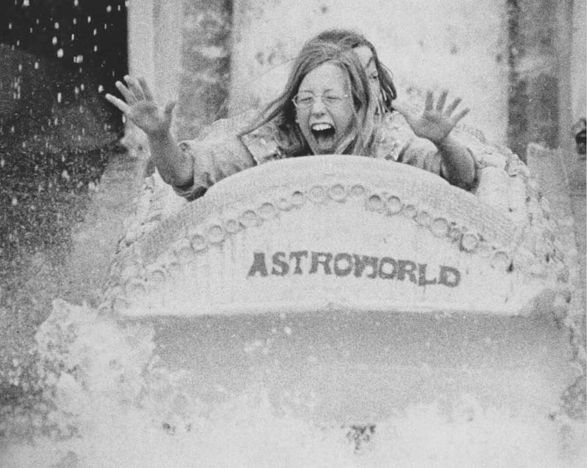A rider gets splashed on AstroWorld's Bamboo Shoot ride on June 1, 1973.