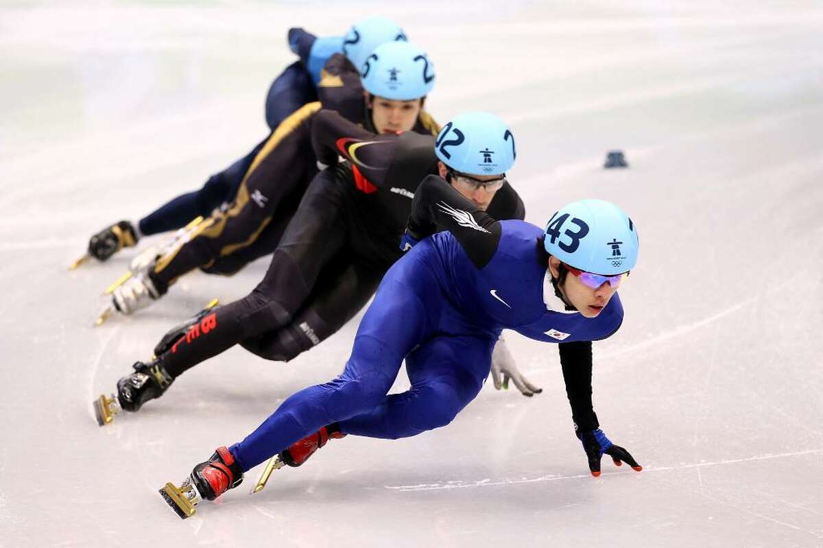 VANCOUVER, BC - FEBRUARY 17: (R-L) Lee Jung-Su of South Korea leads Pieter Gysel of Belgium, Takahiro Fujimoto of Japan and J.R. Celski of the United States in the Short Track Speed Skating Men's 1,000 m on day 6 of the Vancouver 2010 Winter Olympics at Pacific Coliseum on February 17, 2010 in Vancouver, Canada. (Photo by Alex Livesey/Getty Images) *** Local Caption *** Takahiro Fujimoto;J.R. Celski;Pieter Gysel;Lee Jung-Su