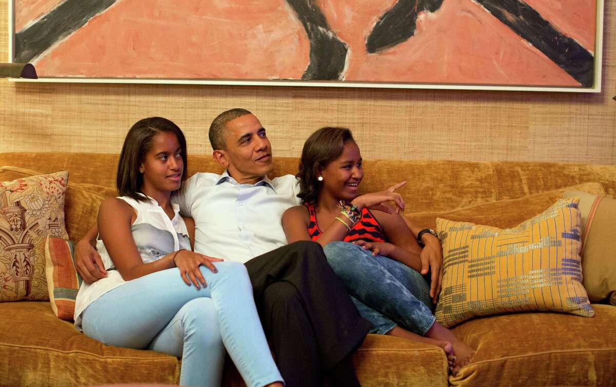 Malia and Sasha Obama, daughters of U.S. President Barack Obama The first teens, Malia (left) and Sasha (right) are often photographed with their famous Dad. Malia, now 16, and Sasha, currently 13, both live in the White House in Washington. 