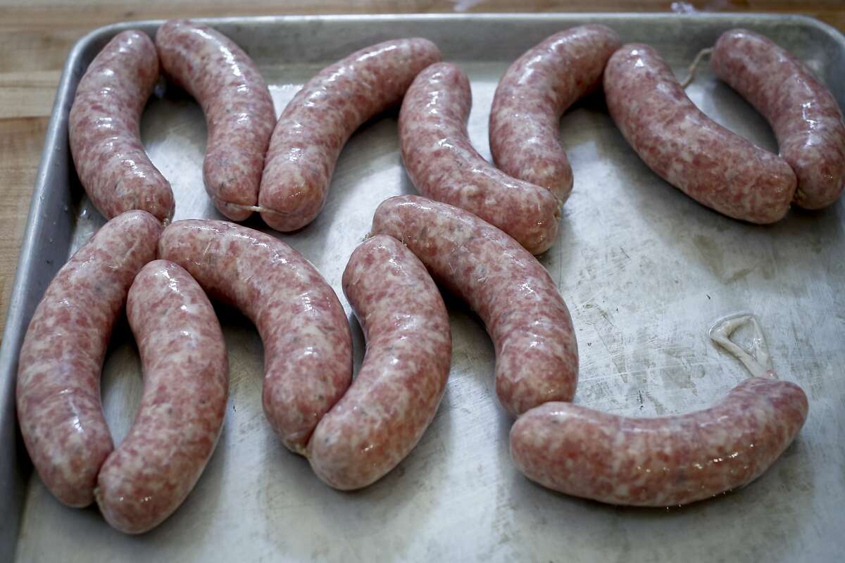 Beer brats sit on a tray at 4505 Meats on Tuesday, July 15, 2014 in San Francisco, Calif.