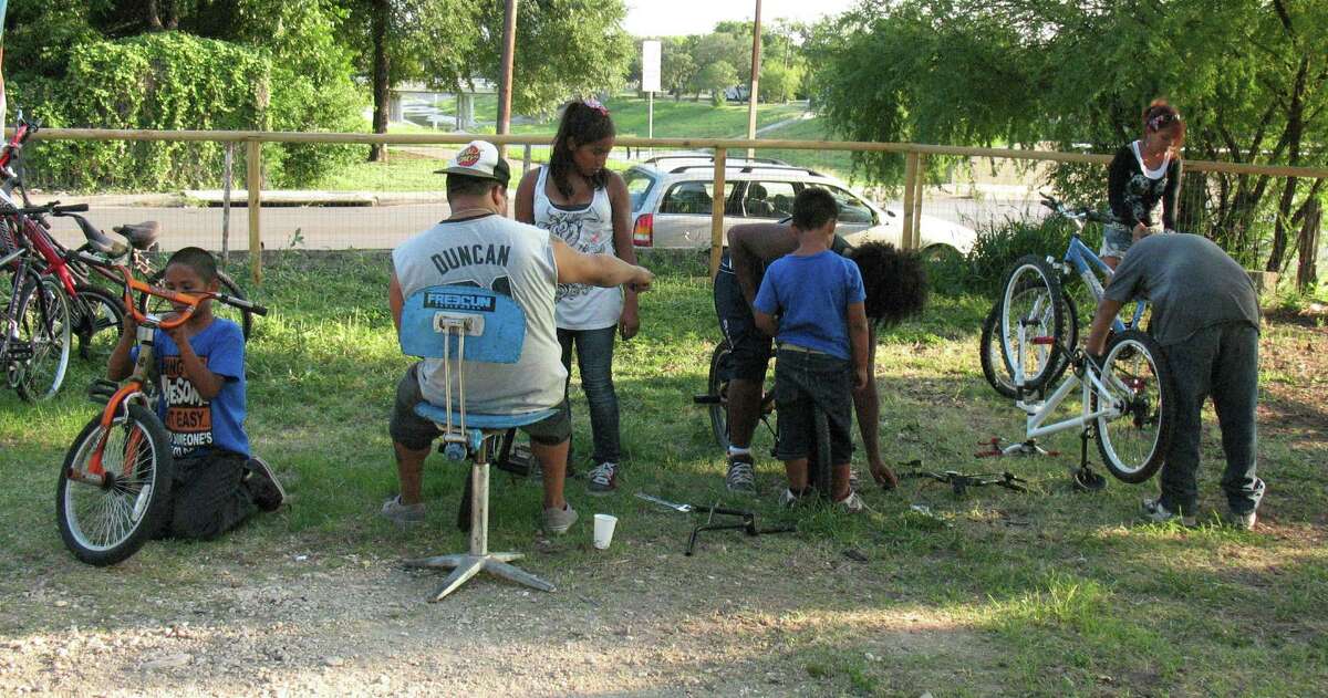The Earn-A-Bike Co-op, which opened on June 14, allows people to earn a bike by volunteering to repair and maintain other people's bikes.