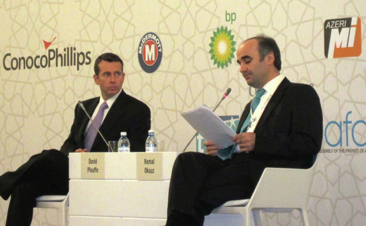 The conference in Azerbaijan's capital included a discussion by Kemal Oksuz, right, with President Barack Obama's 2008 campaign manager, David Plouffe.