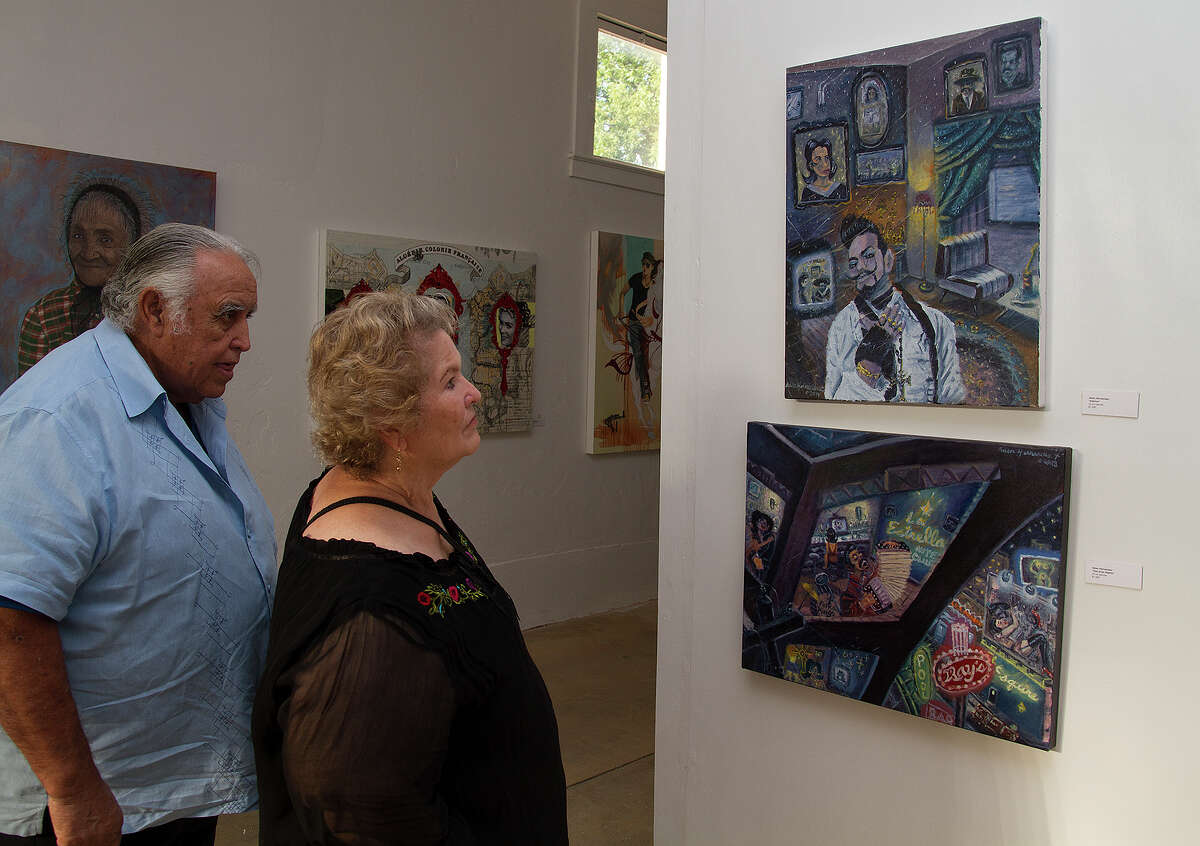 Joe and Rosie Zertuche at the inaugural exhibition of Eco y Voces del Arte, a new exhibition space by Mexican folk artist Veronica Castillo, Saturday, July 26, 2014.
