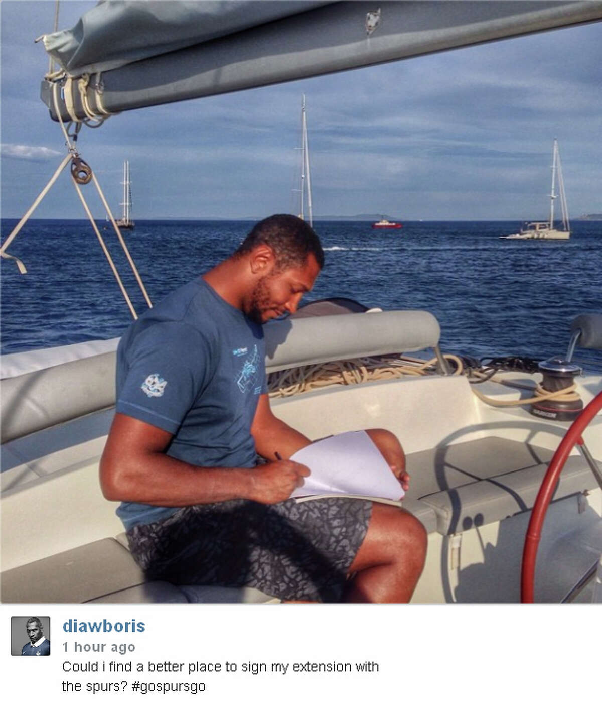 Instagram photo of Boris Diaw signing his extension. @DiawBoris