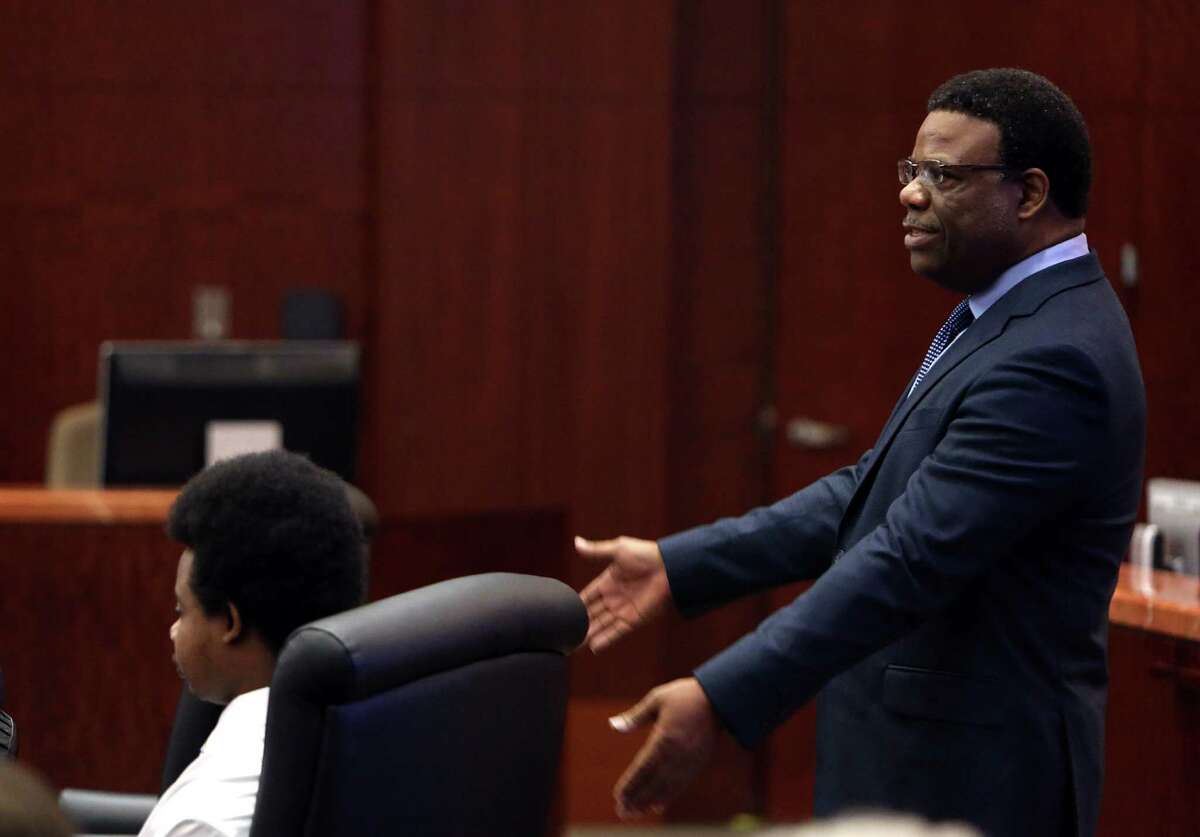 Lawyer Tyrone Moncriffe stands behind defendant while delivering his closing arguments in a death penalty case in 2014. Moncriffe is representing Corey Coleman in an ongoing murder case in Fort Bend County. 