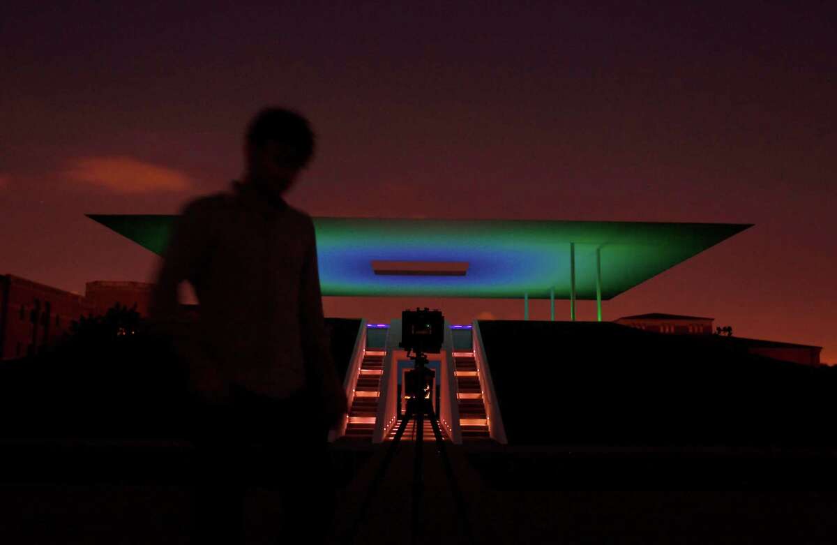 Photographer Casey Dunn takes photos of the new Skyspace by James Turrell at Rice University.