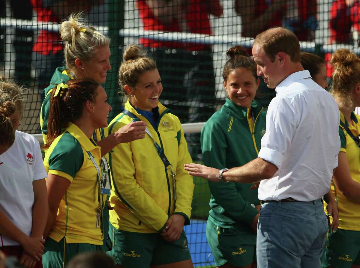 The Duke of Cambridge greets members of the Australian women's hockey team at Glasgow National Hockey Centre during day five of the Glasgow 2014 Commonwealth Games on July 28, 2014 in Glasgow, United Kingdom.