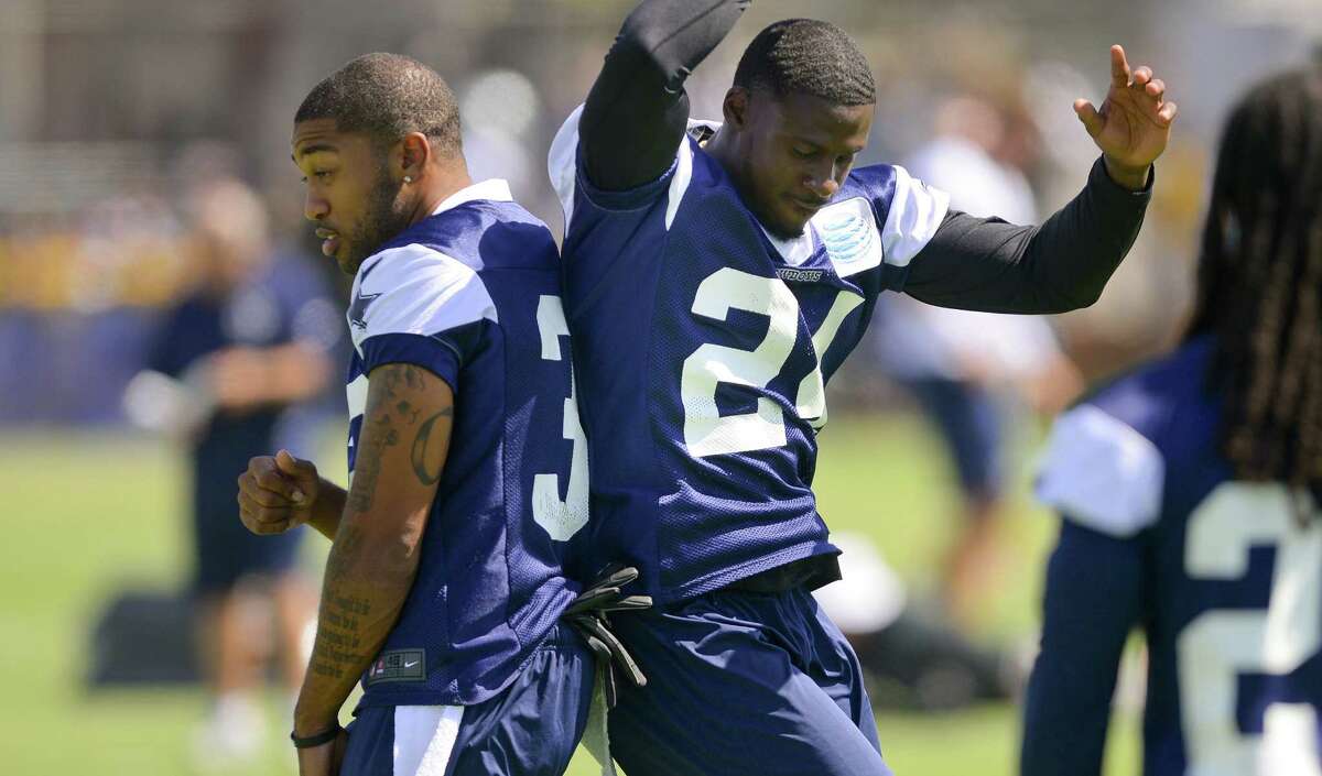 Morris Claiborne (right) is competing with Orlando Scandrick for a starting spot in the Cowboys' secondary.