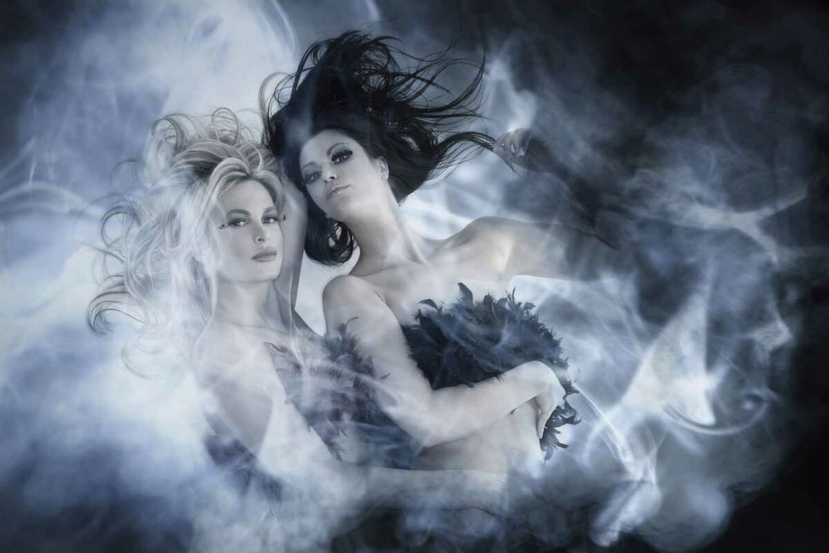 Expensively tousled hair? Weird, neo-gothic underwear/rag things? And they're just sort of floating in a ethereal cloudy abyss? Yup, that's definitely lesbians. 