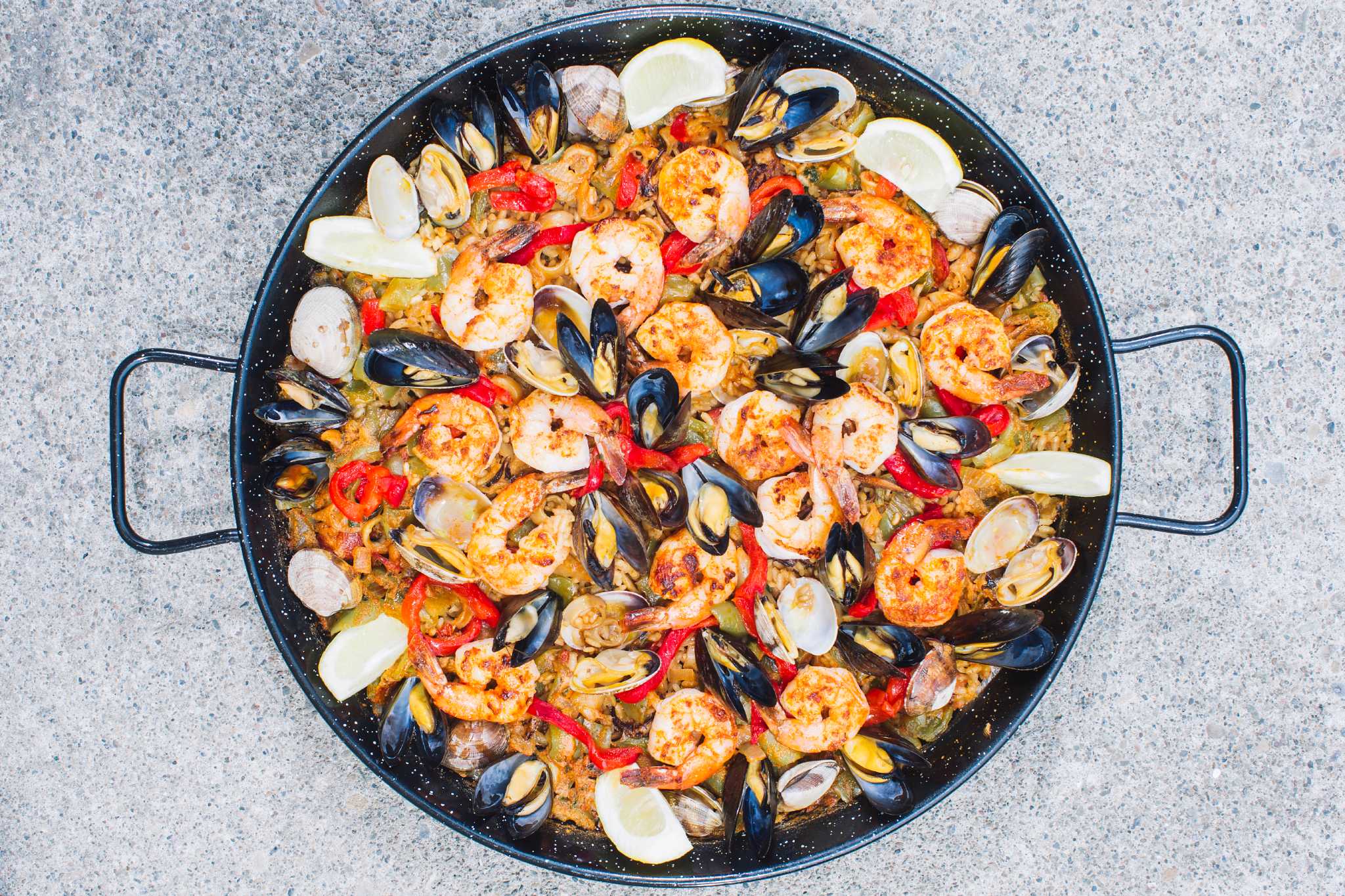 Paella on the grill Spain's riceseafood specialty