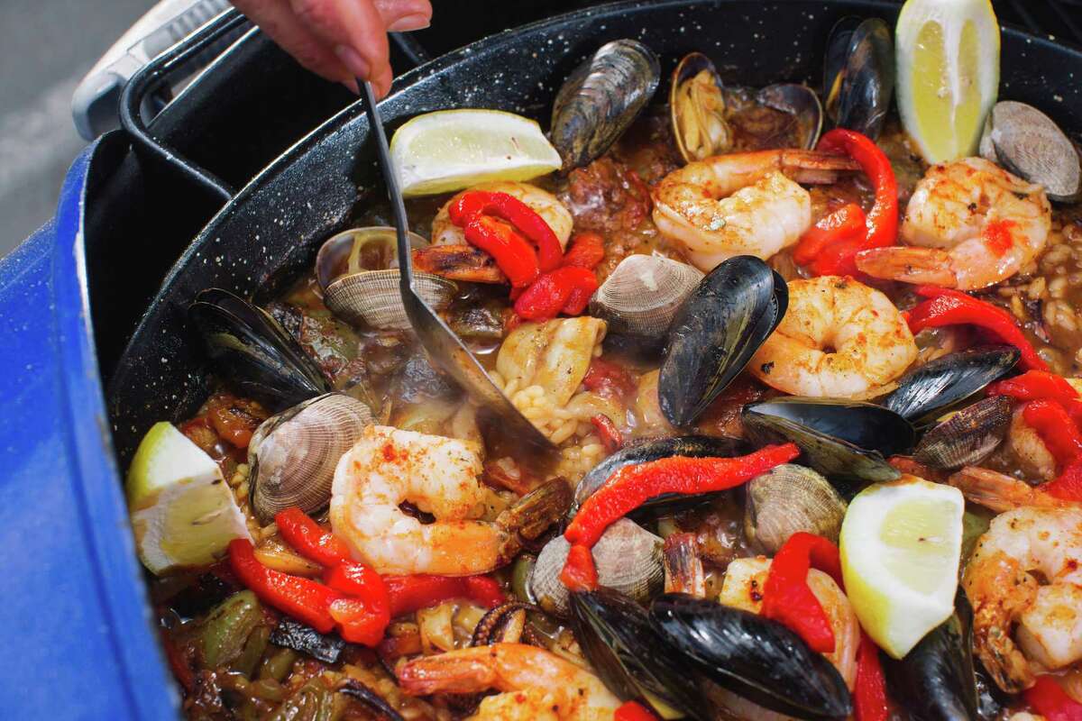 Paella on the grill Spain's riceseafood specialty