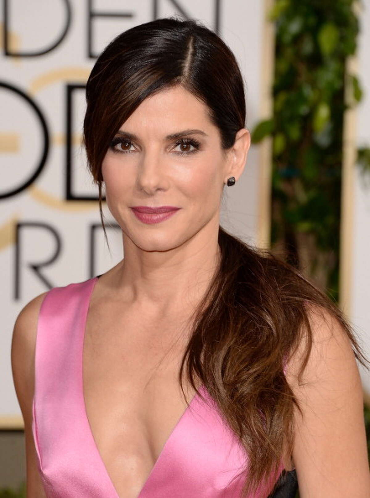 Actress Sandra Bullock attends the 71st Annual Golden Globe Awards held at The Beverly Hilton Hotel