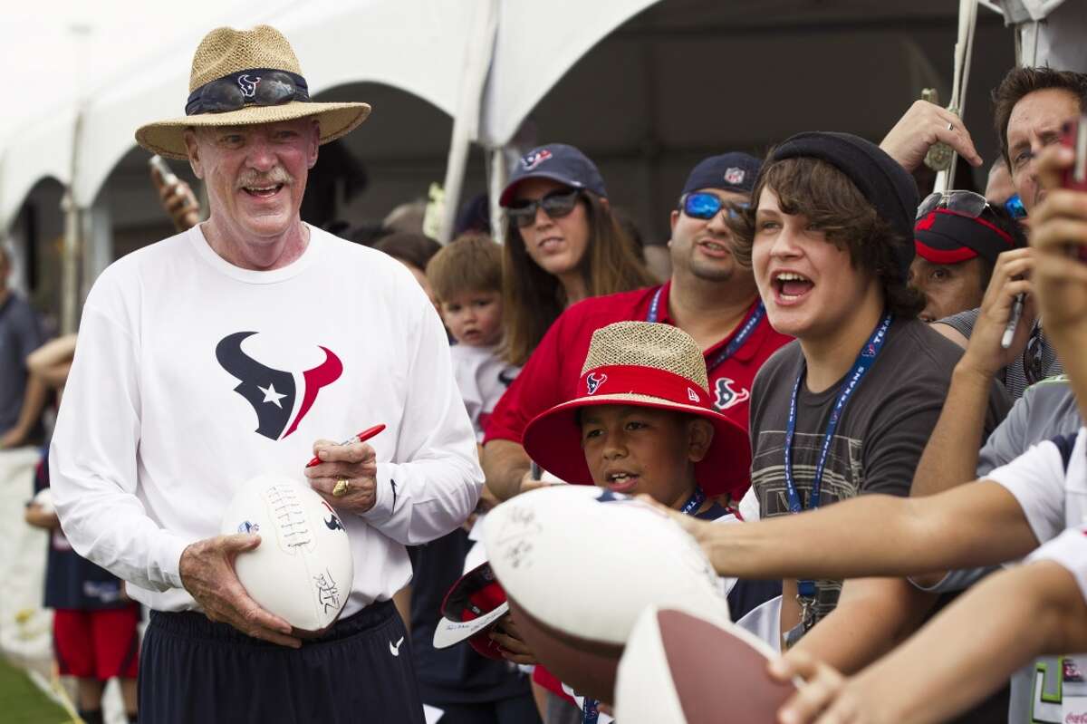 Houston Texans owner Bob McNair signs autographs during Texans training camp at the Methodist Training Center on July 30. ( Brett Coomer / Houston Chronicle )