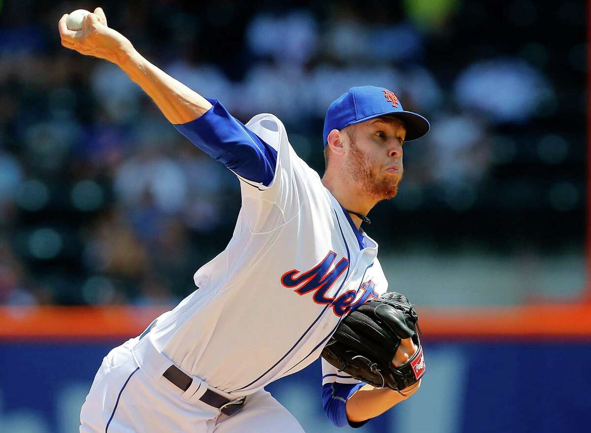 NEW YORK, NY - JULY 30: Zack Wheeler #45 of the New York Mets pitches in the first inning against the Philadelphia Phillies at Citi Field on July 30, 2014 in the Flushing neighborhood of the Queens borough of New York City. (Photo by Jim McIsaac/Getty Images) ORG XMIT: 477587163