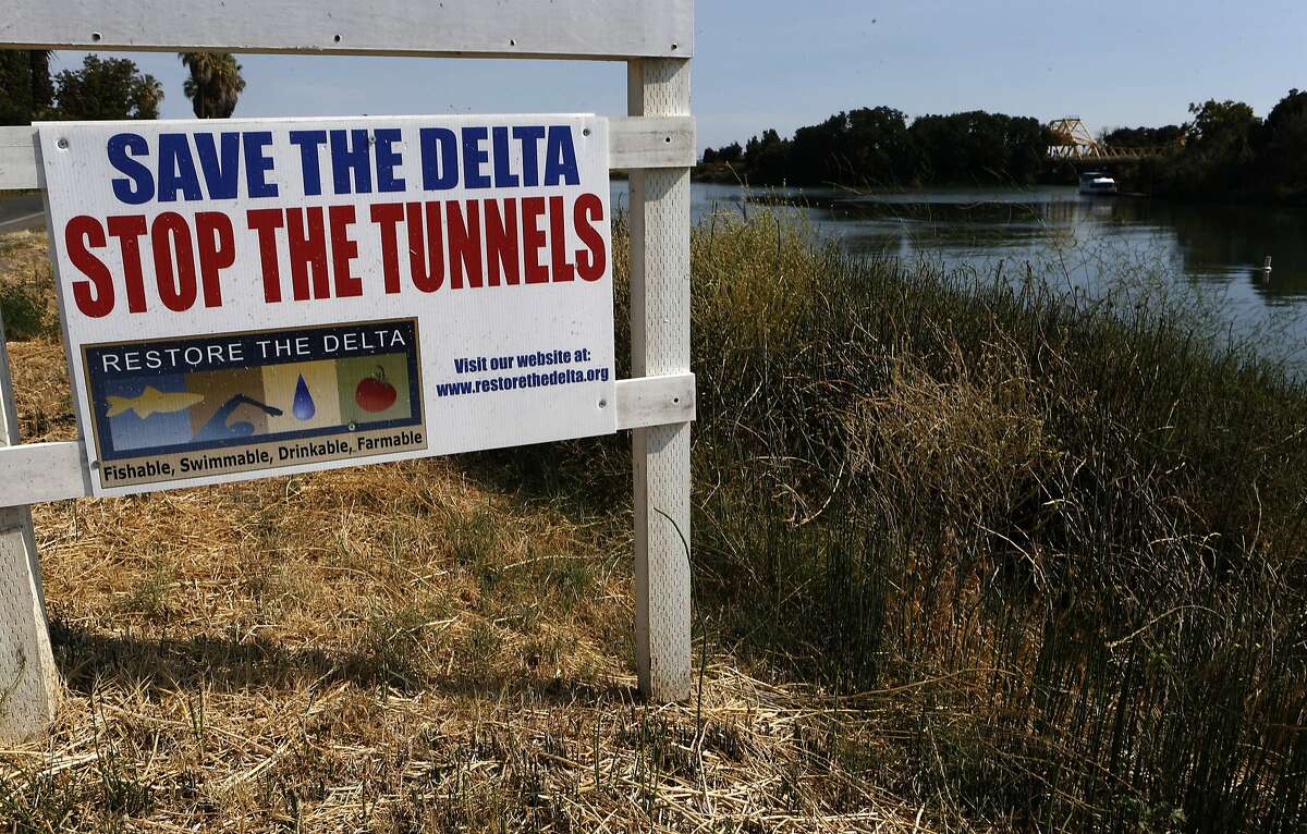 Signs along River road on the Delta waters of the Sacramento River, Calif., as seen on Wednesday July 30, 2014., near Rio Vista, Calif.