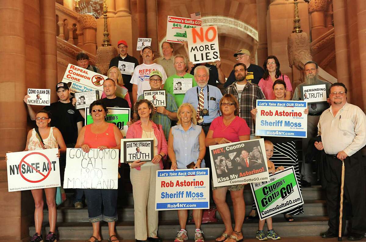 Safe Act opponents conduct a walking tour of the Capitol to demand answers to questions about Gov. Andrew Cuomo's handling of the Moreland Commission on Wednesday, July 30, 2014 in Albany, N.Y. (Lori Van Buren / Times Union)