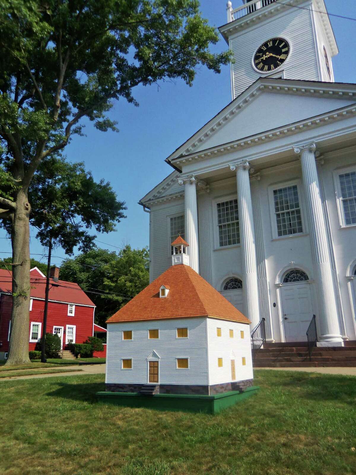 Milford's 1st Congregational Church is looking for a permanent home for its miniature reproduction of its first building, the 1639 First Meetinghouse. They're hoping that the city will come through with a location.