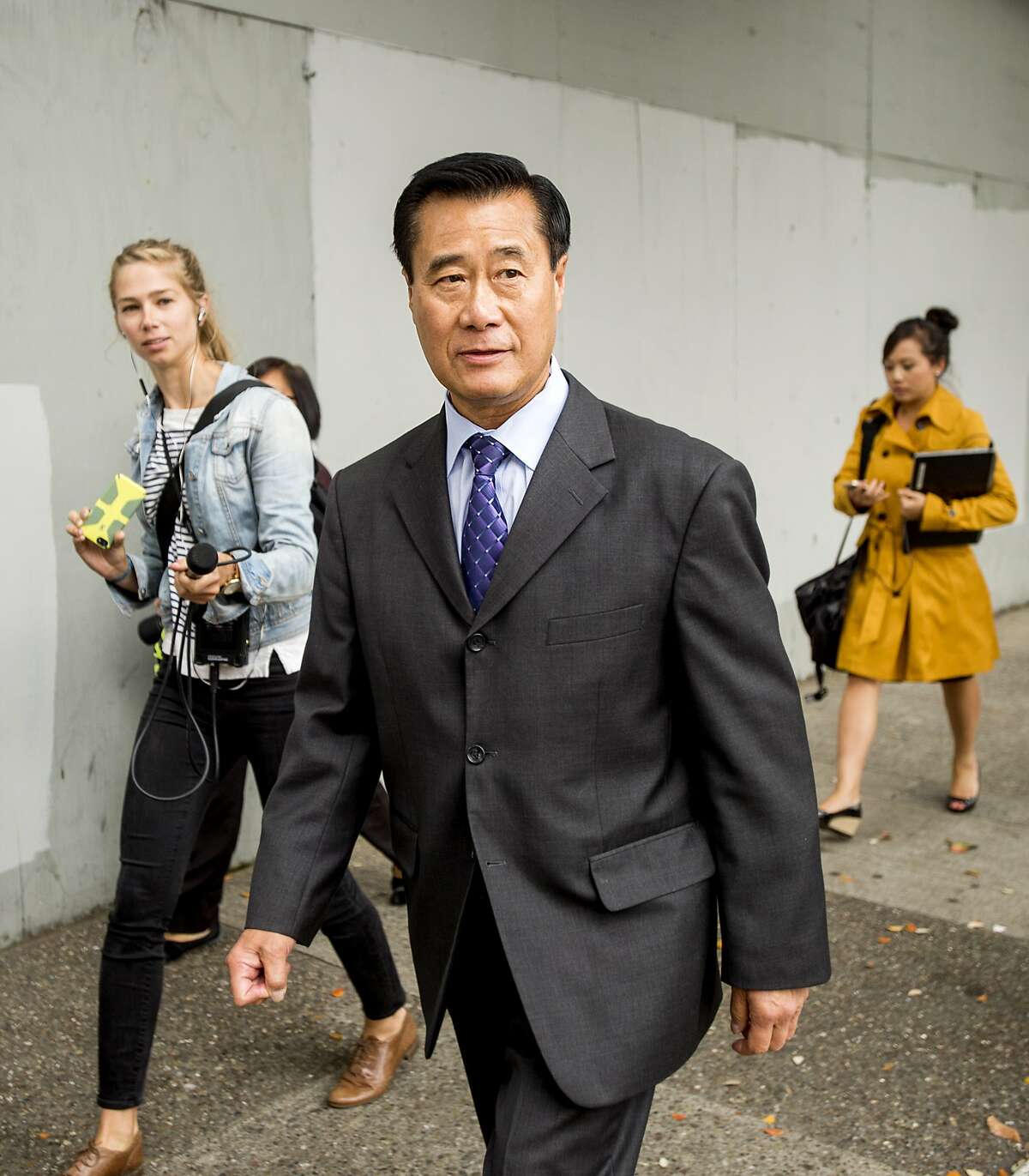 California state Sen. Leland Yee leaves federal court in San Francisco on Thursday, July 31, 2014.