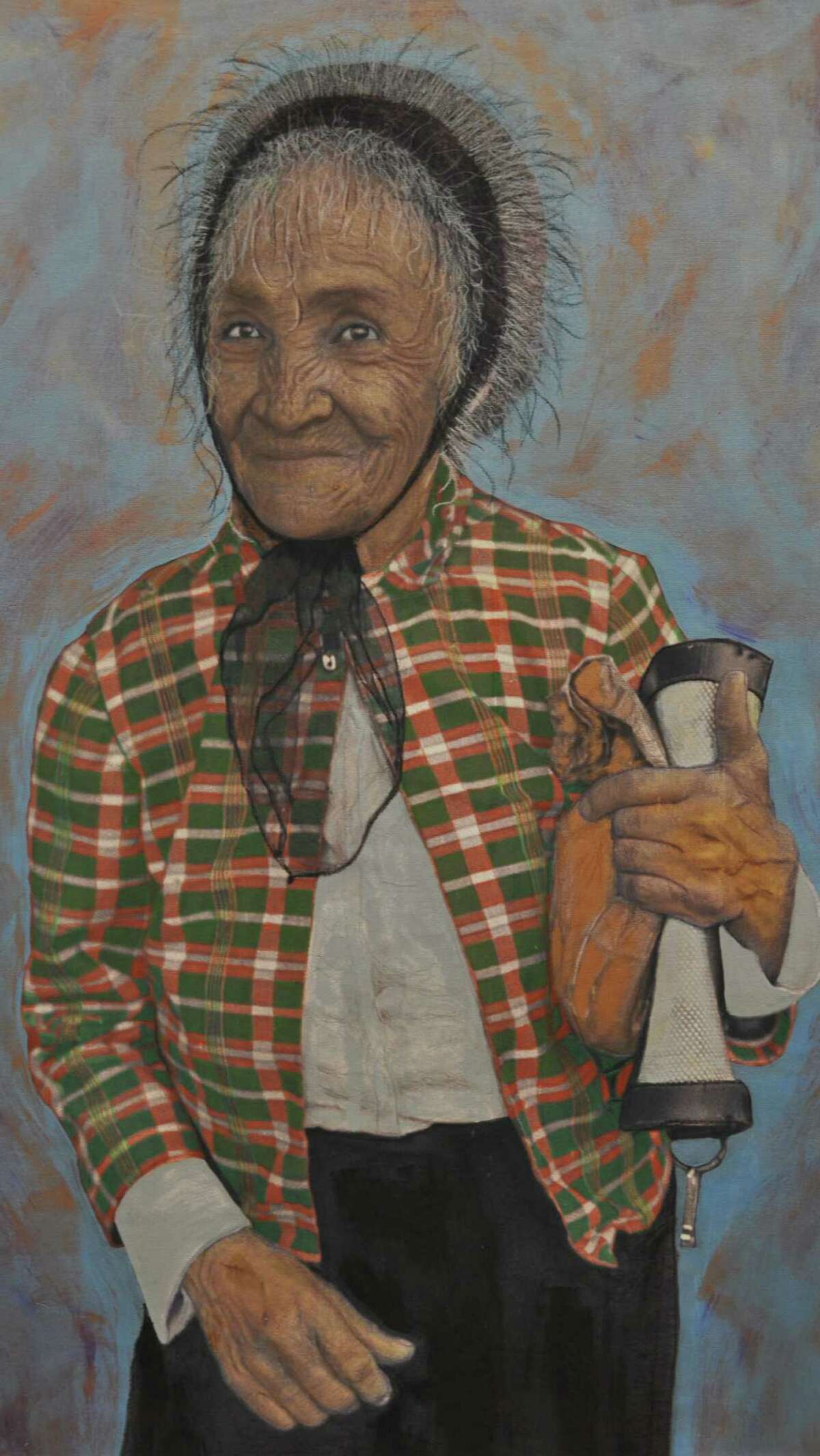 “Dona Maria” by Mary Jessie Garza is part of the inaugural exhibit at Eco y Voces de Arte, a new South Side gallery. The work is a manipulated photograph of the artist's mother.