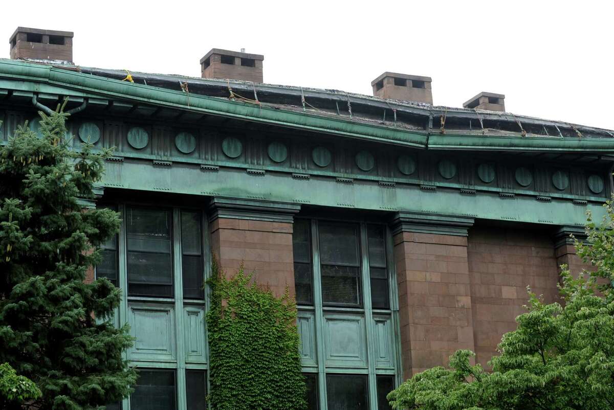 A copper gutter at Bridgeport's historic McLevy Hall came loose two weeks ago. City workers had shore up the heavy piece of the metal trough. Because the commanding building is on the National Register of Historic Places, city staff did not have the capacity to fix the problem.