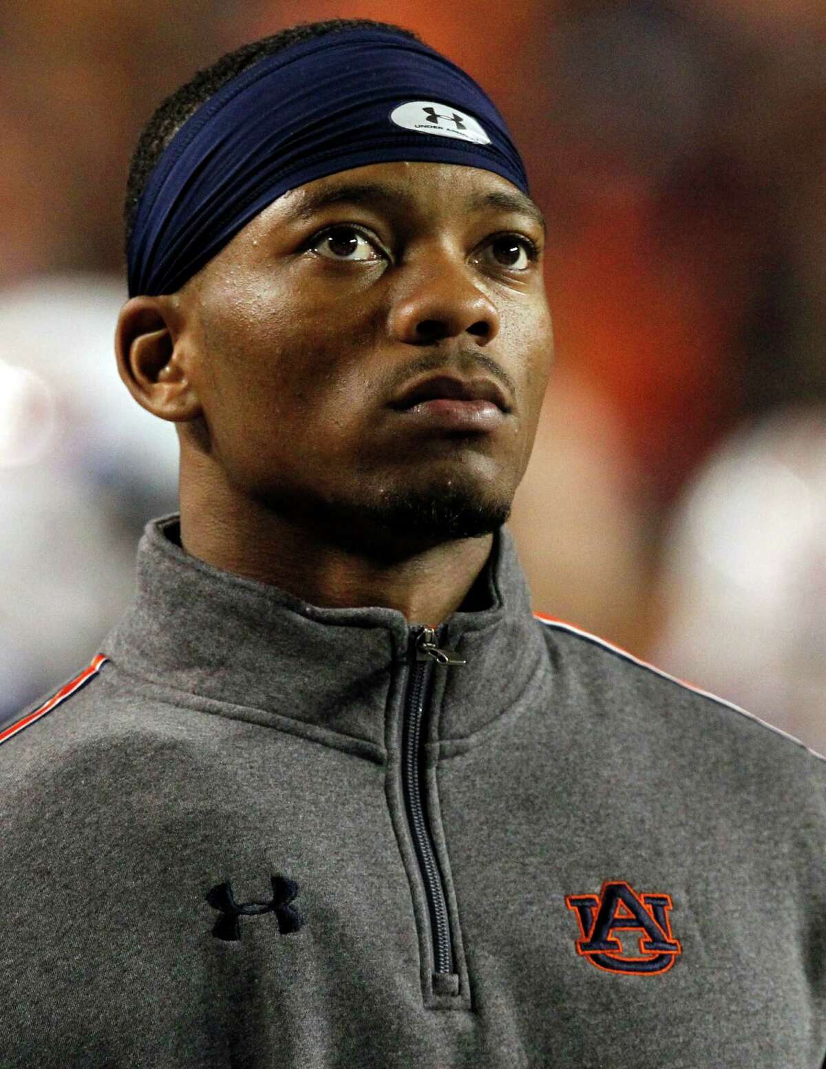 Auburn quarterback Nick Marshall watches from the sidelines out of uniform after suffering an injury during the first half of an NCAA college football game against Florida Atlantic on Saturday, Oct. 26, 2013, in Auburn, Ala. (AP Photo/Butch Dill)