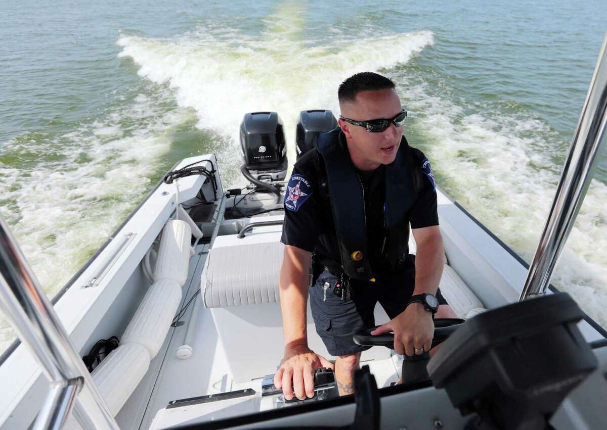 Lt. Tim Cade is one of five Montgomery County constables patrolling Lake Conroe at any one time. "We can add 30 officers and that still won't be enough," he said.