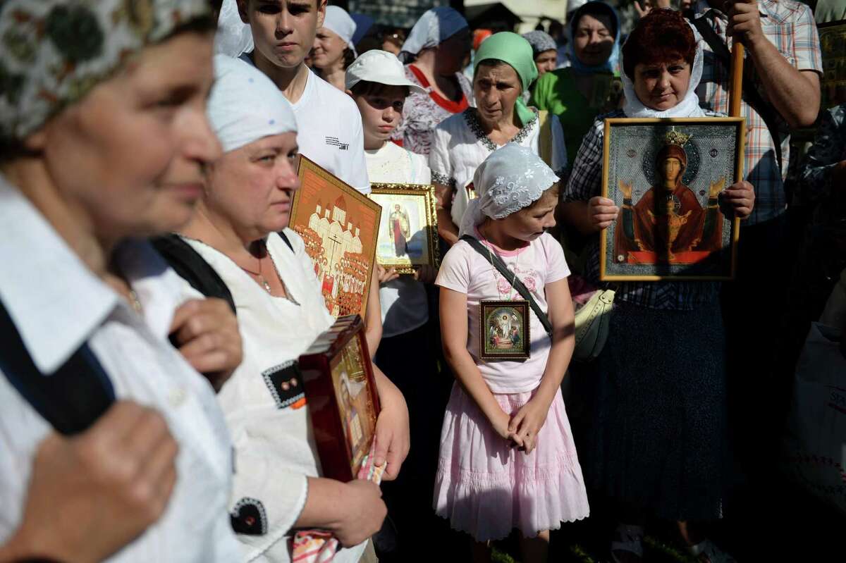 People gather before the start of their pilgrimage to the Trinity Lavra of St. Sergius on July 16 in Khotkovo, Russia. Birthday celebrations emphasized St. Sergius' role in shaping a unified Russia.