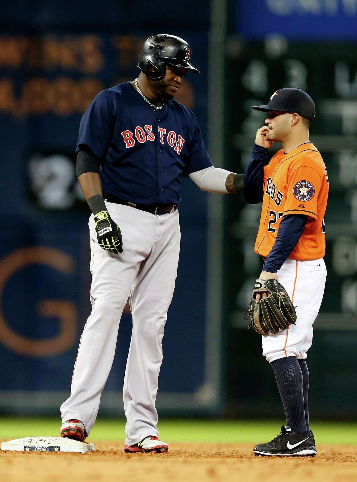 A couple of hitting machines in outsized Red Sox DH David Ortiz, left, and diminutive Astros second baseman Jose Altuve chat at Minute Maid Park in July.
