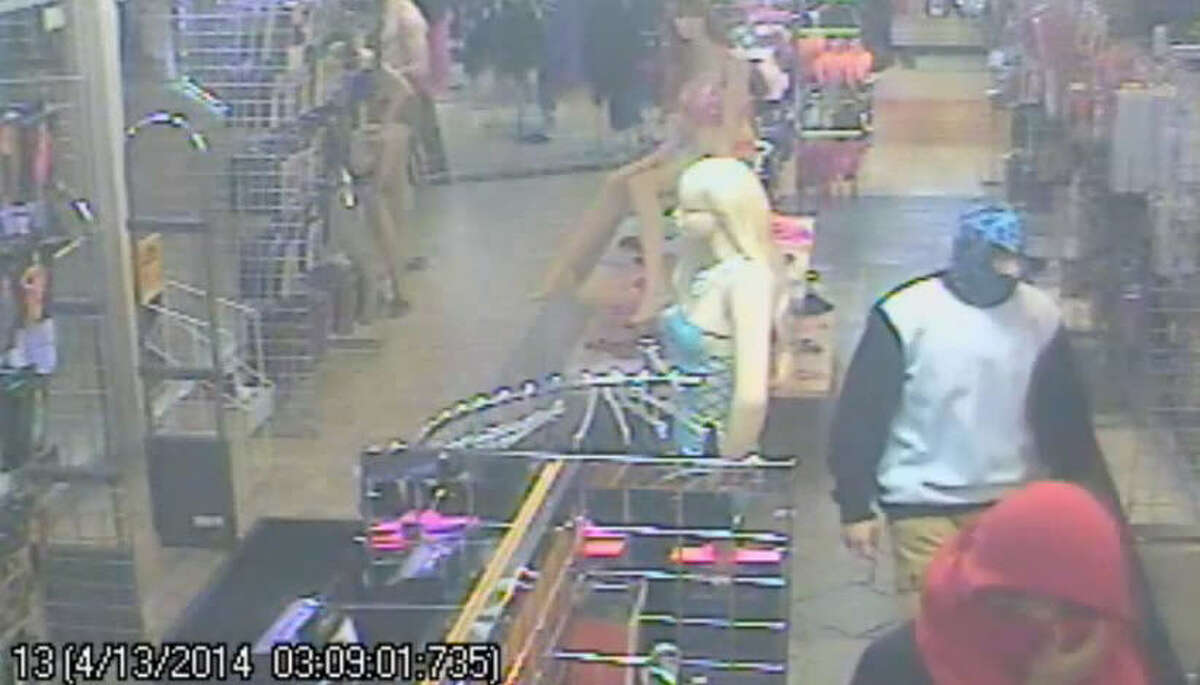 Three Houston teens – ages 16, 15 and 15 – have been arrested and charged with armed robbery for breaking into and shooting up the Katz Boutique adult novelty shop on North Freeway. The bumbling crooks trip over one another on the way out, causing the gun to accidentally fire, wounding a store mannequin and shattering the front door. | Houston Police Department