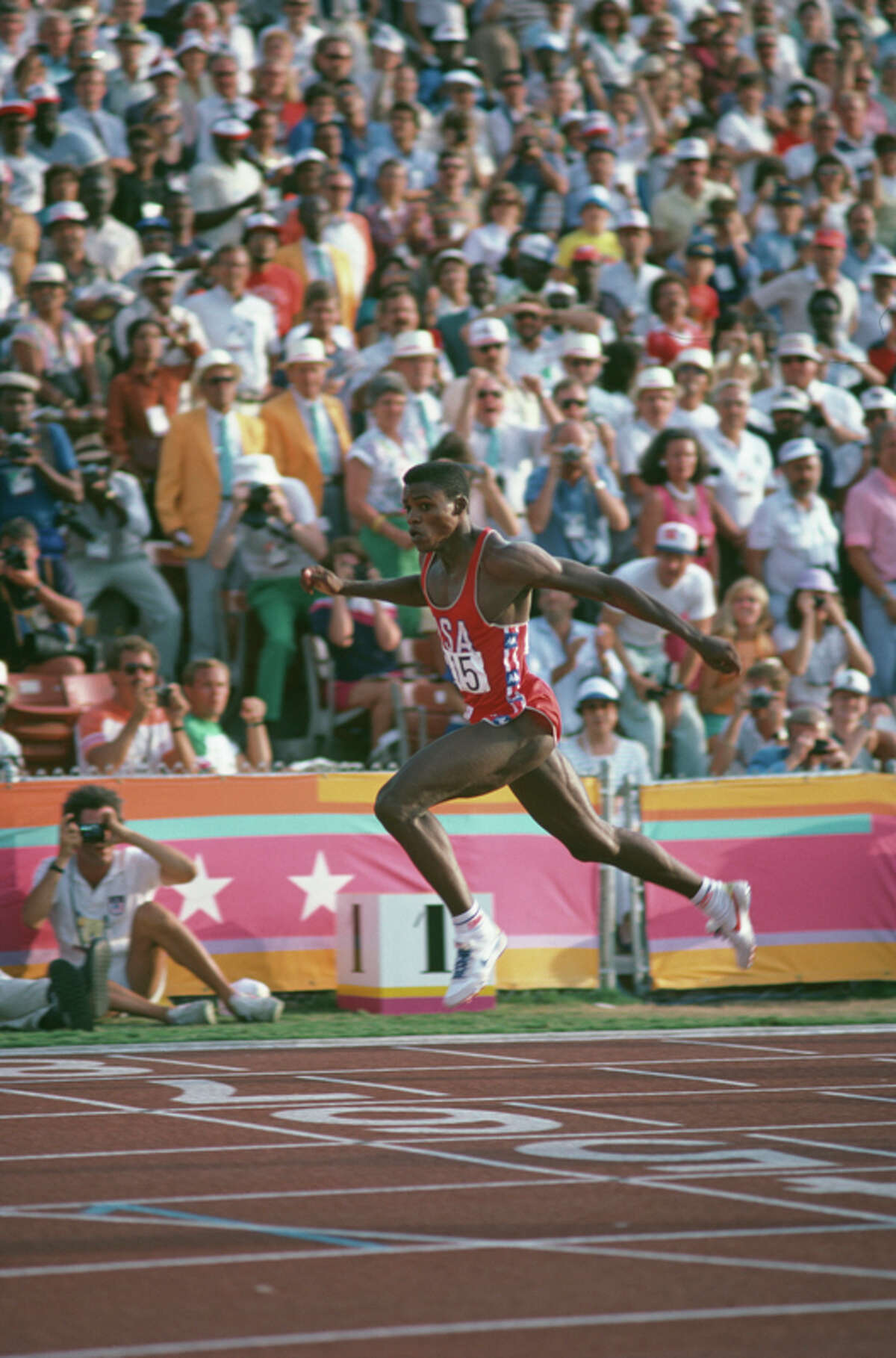 Carl Lewis donating Olympic medals to new Smithsonian museum