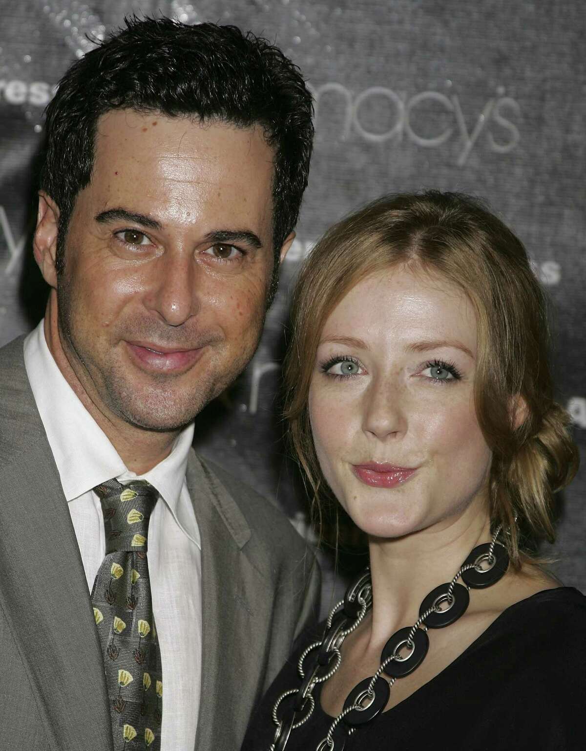 SANTA MONICA, CA - SEPTEMBER 27: Actors Jonathan Silverman (L) and Jennifer Finnigan attend the Macy's Passport auction and fashion show in celebration of it's 25th anniversary at Barker Hangar on September 27, 2007 in Santa Monica, California. (Photo by David Livingston/Getty Images)
