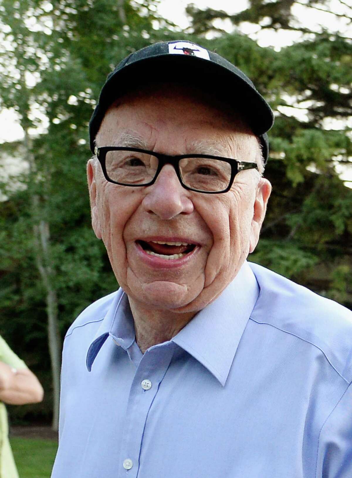 FILE - JULY 16, 2014: It was reported that 21st Century Fox made a bid of $80 billion to buy Time Warner last month, July 16, 2014. SUN VALLEY, ID - JULY 10: Media mogul Rupert Murdoch executive chairman of News Corporation and chairman and CEO of 21st Century Fox arrives for the Allen & Co. annual conference at the Sun Valley Resort on July 10, 2013 in Sun Valley, Idaho. The resort will host corporate leaders for the 31st annual Allen & Co. media and technology conference where some of the wealthiest and most powerful executives in media, finance, politics and tech gather for weeklong meetings. Past attendees included Warren Buffett, Bill Gates and Mark Zuckerberg. (Photo by Kevork Djansezian/Getty Images)