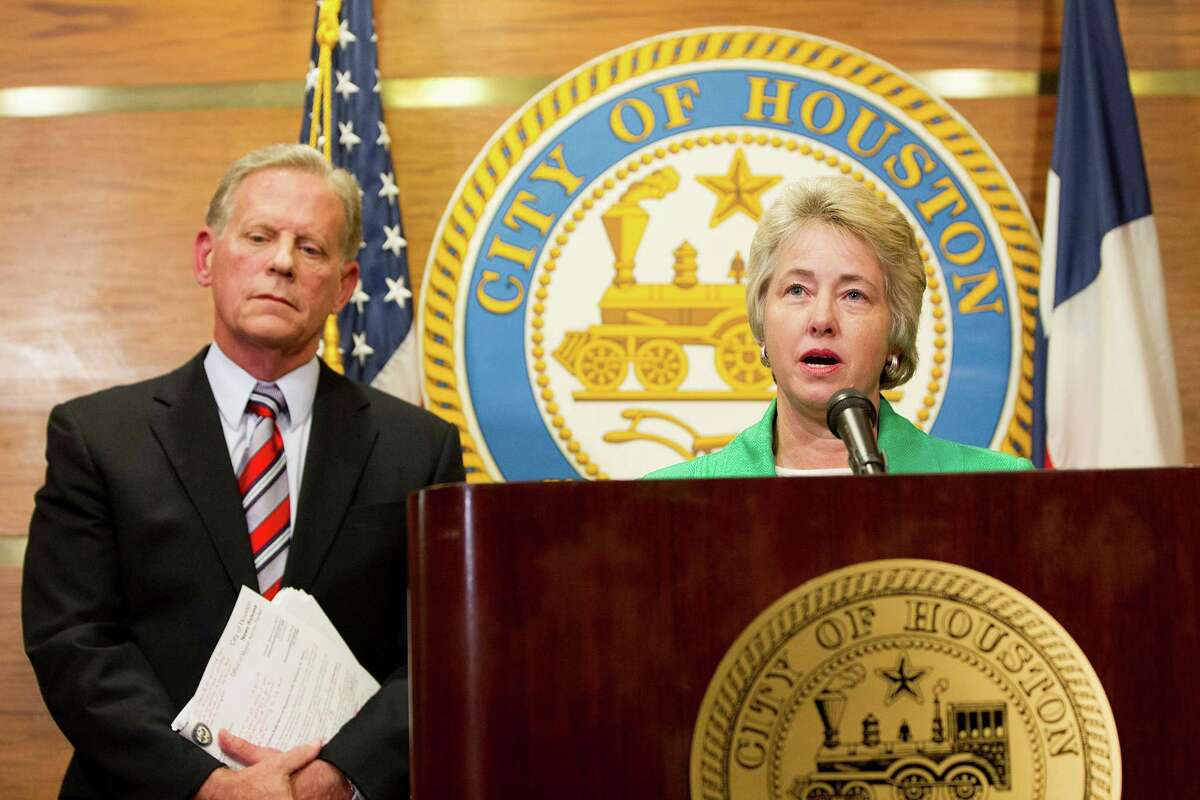 Mayor Annise Parker and City Attorney David Feldman, announce that the petition to repeal the Houston Equal Rights Ordinance adopted by the City Council in May has fallen short of the number of signatures required due to errors in the signature collection process Monday, Aug. 4, 2014, in Houston. The 15,249 valid signatures fell short of the 17,269 required. Pages of signatures didn't qualify due to "irregularities and problems." ( Johnny Hanson / Houston Chronicle )