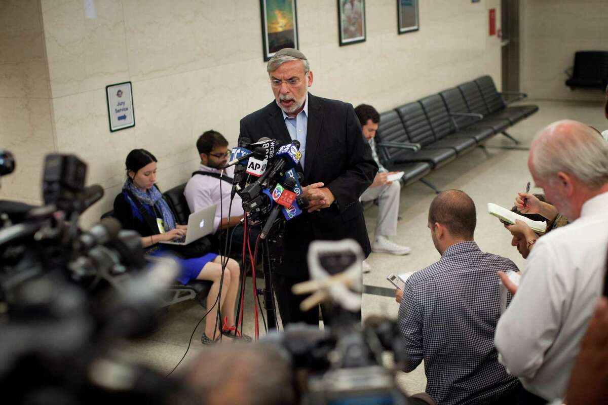 Assemblyman Dov Hikind, of the New York State Assembly, speaks to reporters after leaving a courtroom where Levi Aron was sentenced in New York, Aug. 29, 2012. (Richard Perry/The New York Times)