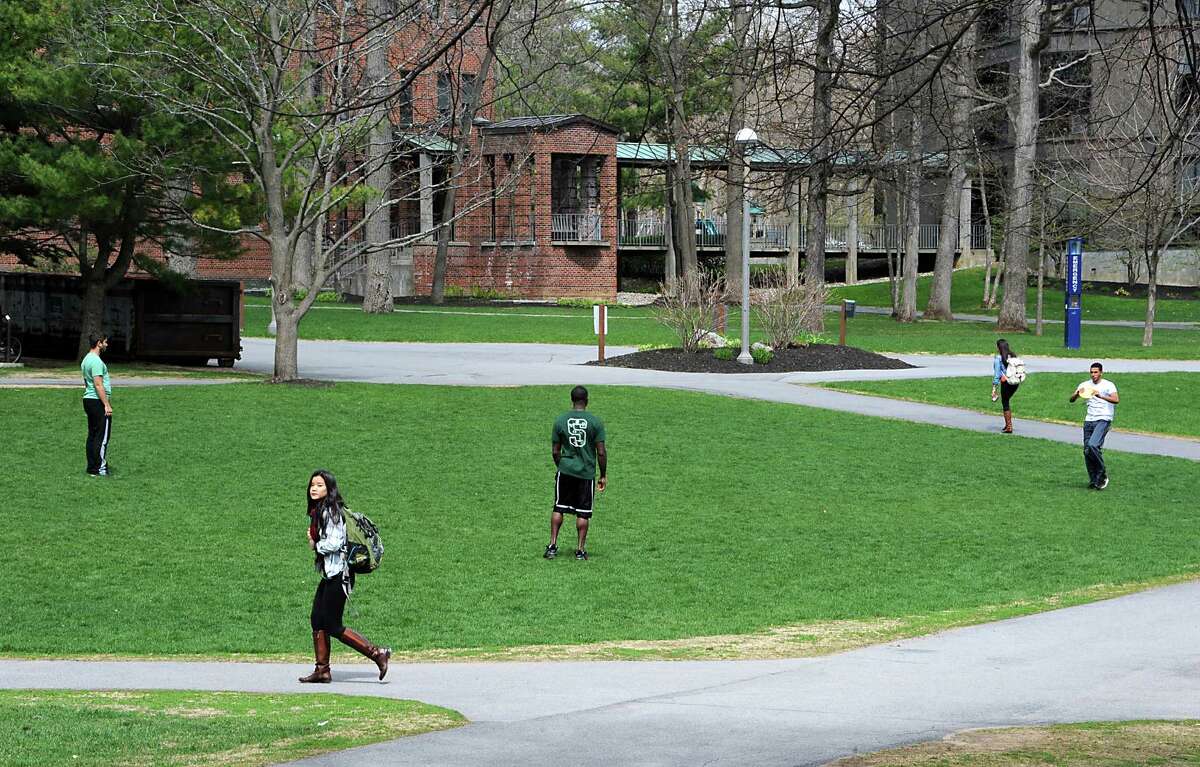 Students walk and play frisbee on the Skidmore College campus on Tuesday May 6, 2014 in Saratoga Springs, N.Y. (Lori Van Buren / Times Union)