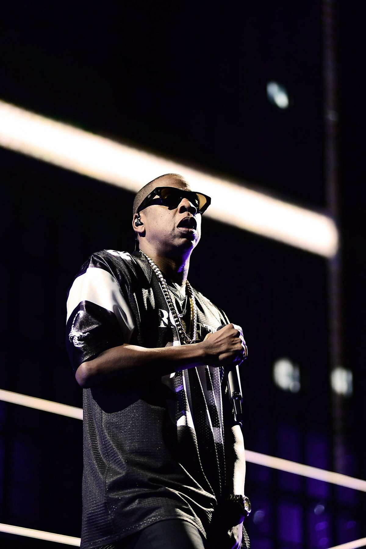 JAY Z performs during the "Beyonce and Jay Z - On the Run" tour at AT&T Park on Tuesday, Aug. 5, 2014, in San Francisco. (Photo by Mason Poole/Invision for Parkwood Entertainment/AP Images)