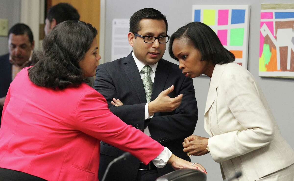 District 3 Council person Rebecca J. Viagran (from left), District 1 Councilman Diego M. Bernal and Mayor Ivy Taylor talk before the City Council B Session to learn the results of a petition drive to put the VIA Metropolitan Transit's streetcar project to a vote on Wednesday, August 6, 2014.