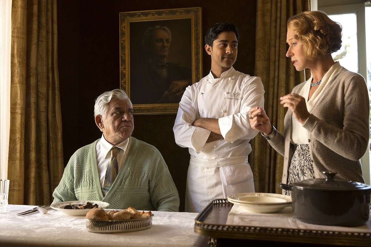 This image released by DreamWorks II shows, from left, Om Puri, Manish Dayal and Helen Mirren in a scene from ?The Hundred-Foot Journey.? (AP Photo/François Duhamel, DreamWorks II)