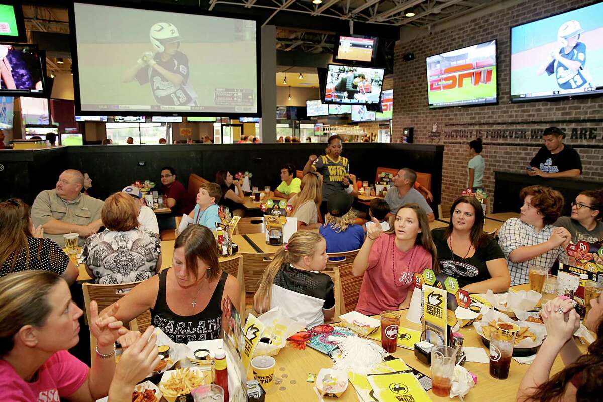 8/6/2014: A large crowd watches Texas East, Pearland play against Louisiana, Lake Charles at Buffalo Wild Wings watch party in Pearland for the Pearland East Little League team, which is playing in the Southwest Regional final in Waco, TX..