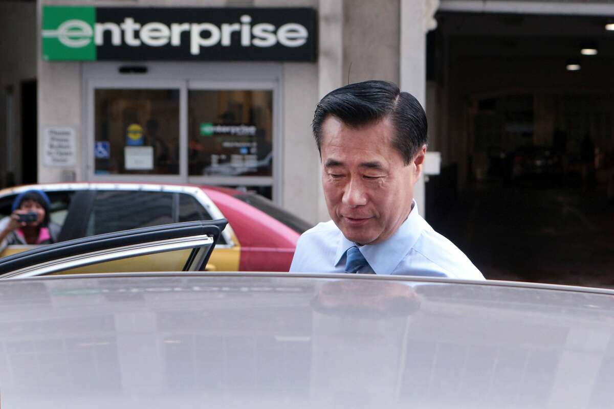 Former state Sen. Leland Yee gets into a waiting car outside the Phillip Burton Federal Courthouse after a hearing on expanded indictment charges including racketeering and various counts of corruption, money laundering and trafficking in weapons and drugs on Thursday, August 7, 2014 in San Francisco, Calif.